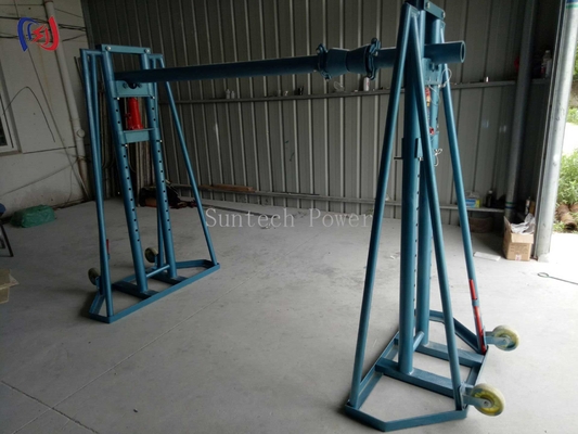 Un support hydraulique de câble à rouleaux.